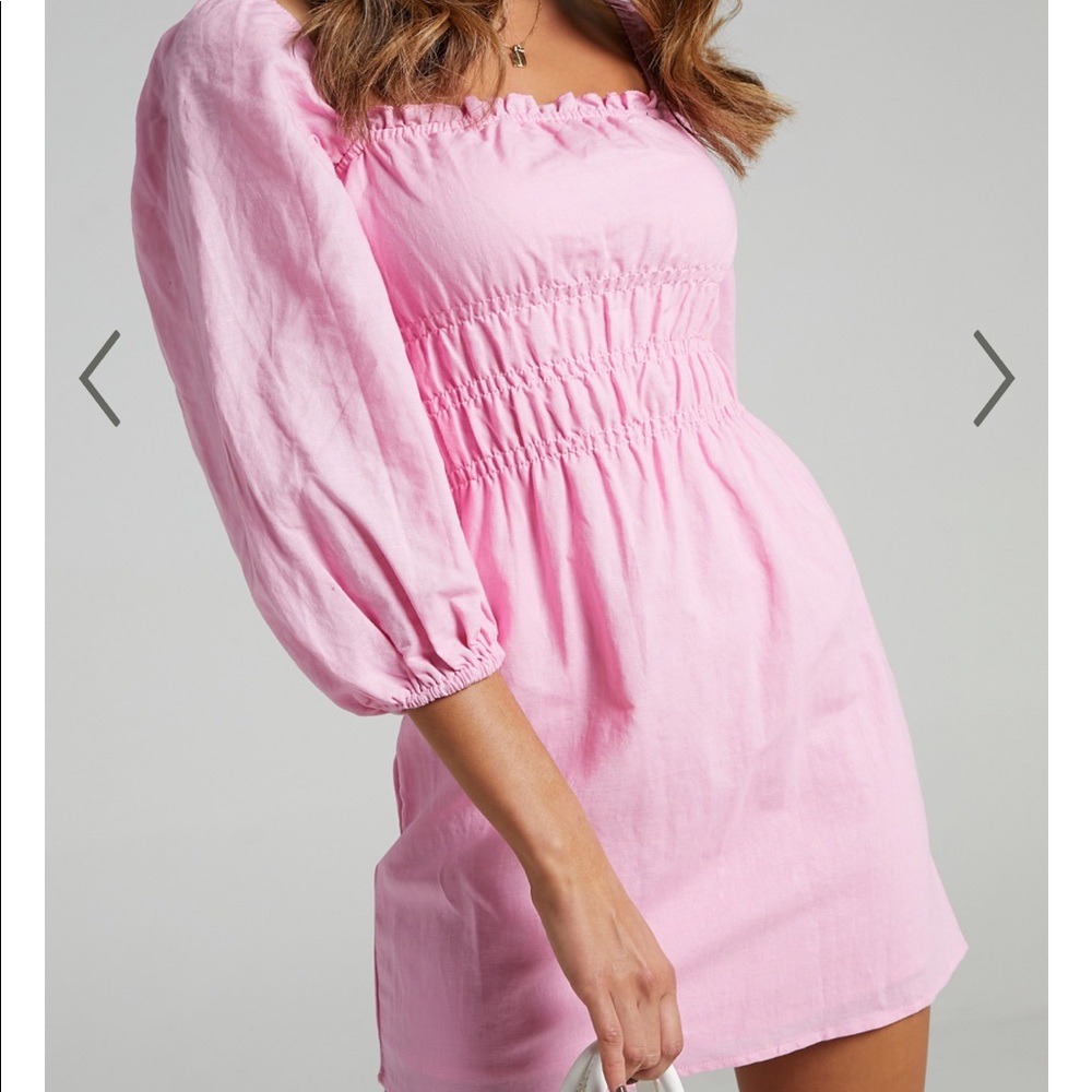 Sold out every where Charlie holiday bohemian smocked dress in pink.
